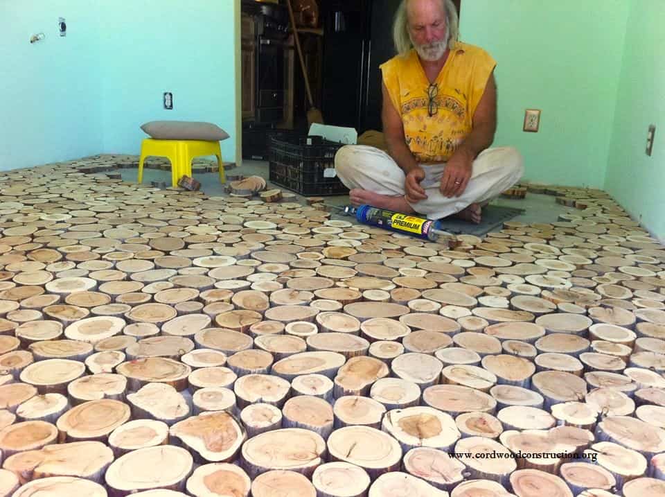 suelo con discos de madera - pegar los discos al suelo